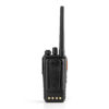 Black handheld two-way radio with a tall antenna standing upright; visible battery contacts at the bottom.